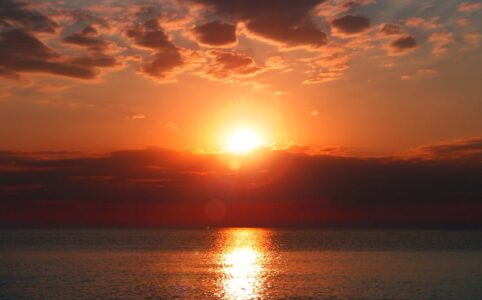 calm blue sea during golden hour