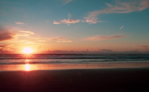 photo of shore and sunset