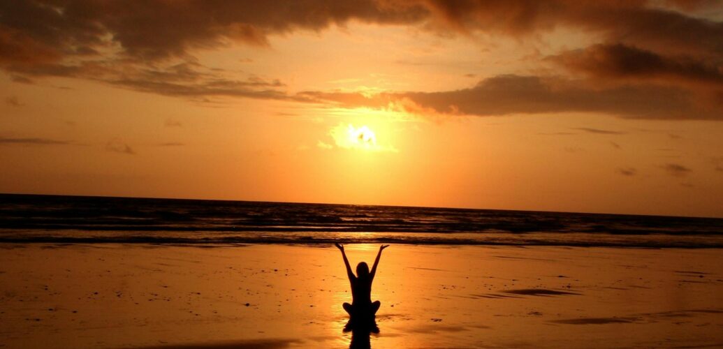 silhouette of person raising its hand