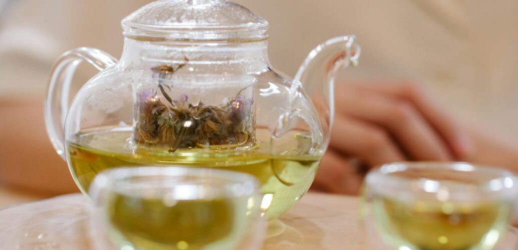 a close up shot of a pot of tea